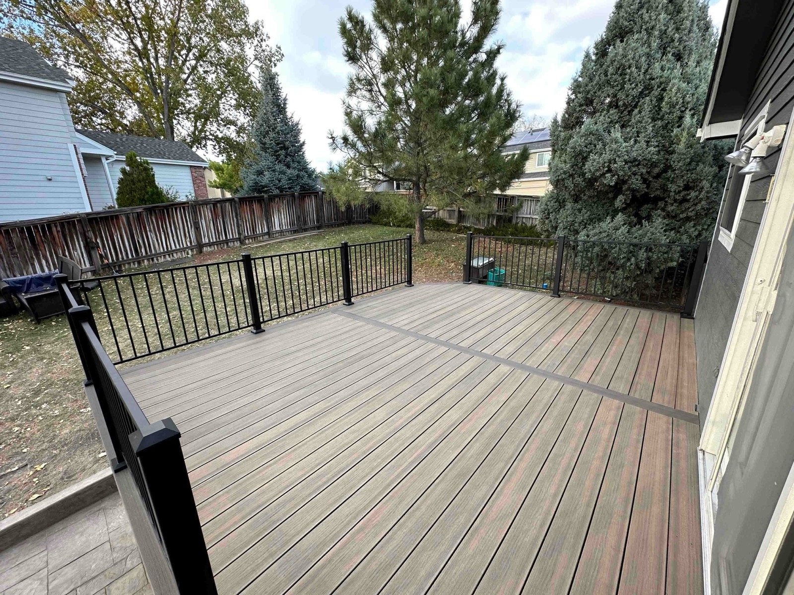 A clean capped composite deck on a Colorado Front Range home